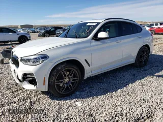 2021 BMW X4 xDrive30i with VIN 5UX2V1C01M9F91616, listed as a Copart auction lot 74006453 with 0 mi miles. Bid and sale history available at carsss.com. Image 1.