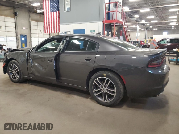 2019 Dodge Charger SXT with VIN 2C3CDXJG4KH520470, listed as a Copart auction lot 51947755 with 90,876 mi miles and Salvage Title. Bid and sale history available at DreamBid. Image 2.