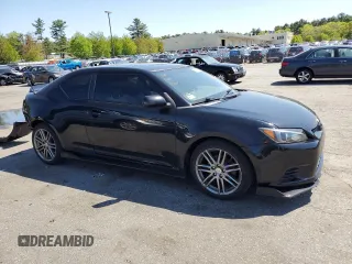 2011 Scion tC z VIN JTKJF5C70B3016542, wystawiony jako Copart lot #55829715 z przebiegiem 99 791 mil mil oraz Szkoda całkowita • Salvage title. Historia ofert i sprzedaży dostępna na DreamBid. Obrazek 4.