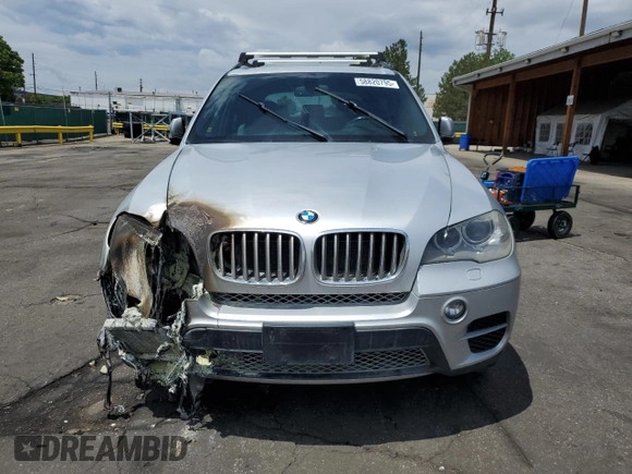 2013 BMW X5 xDrive50i with VIN 5UXZV8C58D0C14983, listed as a Copart auction lot 58820795 with 99,337 mi miles and Salvage title. Bid and sale history available at DreamBid. Image 5.