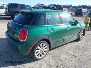 2020 MINI Hardtop 4 Door Cooper with VIN WMWXU7C06L2M63032, listed as a IAAI auction lot 42572567 with 86,220 mi miles and . Bid and sale history available at DreamBid. Image 4.