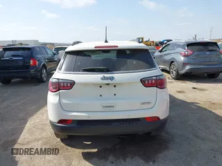 2021 Jeep Compass Latitude with VIN 3C4NJCBBXMT563942, listed as a IAAI auction lot 42045108 with 166,153 mi miles and . Bid and sale history available at DreamBid. Image 16.