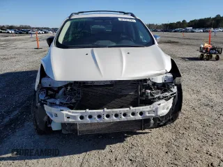 2016 Ford Escape SE with VIN 1FMCU0G99GUC64547, listed as a Copart auction lot 42103755 with 185,331 mi miles and Salvage Title. Bid and sale history available at carsss.com. Image 5.