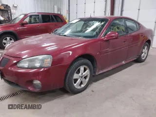 2005 Pontiac Grand Prix z VIN 2G2WP522651347494, wystawiony jako IAAI lot #41967441 z przebiegiem 303 769 mil mil oraz . Historia ofert i sprzedaży dostępna na DreamBid. Obrazek 2.