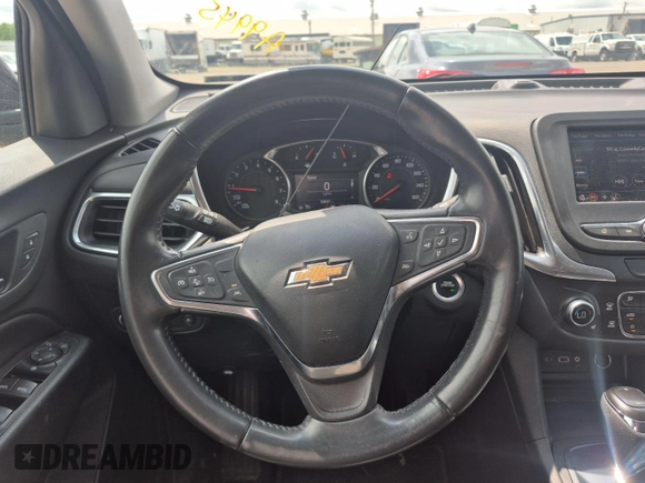 2021 Chevrolet Equinox LT z VIN 3GNAXJEV2ML379402, wystawiony jako IAAI lot #42504649 z przebiegiem 58 647 mil mil oraz . Historia ofert i sprzedaży dostępna na DreamBid. Obrazek 1.