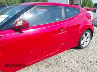2013 Hyundai Veloster w/Gray Int with VIN KMHTC6AD8DU112810, listed as a IAAI auction lot 42144625 with 142,524 mi miles and . Bid and sale history available at DreamBid. Image 17.
