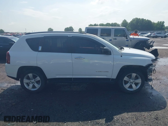 2016 Jeep Compass Sport with VIN 1C4NJCBA2GD743143, listed as a IAAI auction lot 42543350 with 131,038 mi miles and . Bid and sale history available at DreamBid. Image 14.