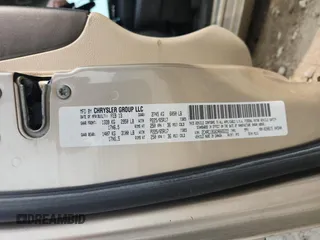 2013 Chrysler Town & Country Touring z VIN 2C4RC1BG6DR665222, wystawiony jako Copart lot #59417135 z przebiegiem 169 833 mil mil oraz Nie do naprawy • Non repairable. Historia ofert i sprzedaży dostępna na DreamBid. Obrazek 14.