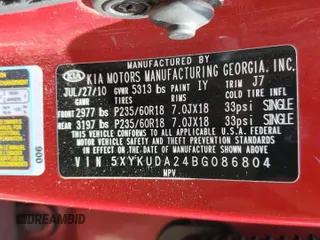 2011 Kia Sorento EX z VIN 5XYKUDA24BG086804, wystawiony jako Copart lot #57394805 z przebiegiem 148 932 mil mil oraz Szkoda całkowita • Salvage title. Historia ofert i sprzedaży dostępna na DreamBid. Obrazek 13.