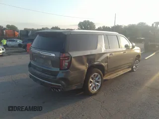 2023 Chevrolet Suburban Premier z VIN 1GNSKFKD8PR305863, wystawiony jako IAAI lot #37536455 z przebiegiem 13 765 mil mil oraz . Historia ofert i sprzedaży dostępna na DreamBid. Obrazek 4.