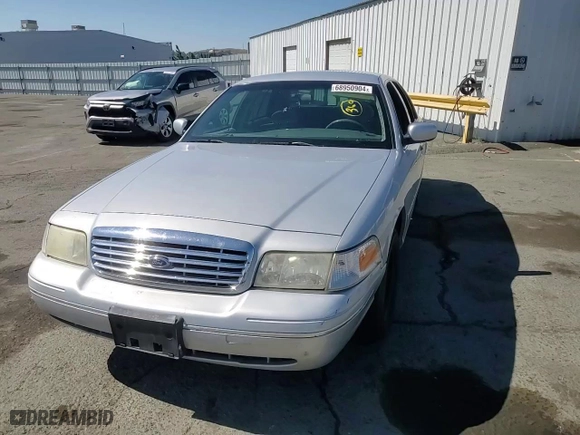2000 Ford Crown Victoria Police Pkg Police Interceptor with VIN 2FAFP71W4YX119755, listed as a Copart auction lot 68950904 with NaN miles and Salvage Title. Bid and sale history available at carsss.com. Image 11.