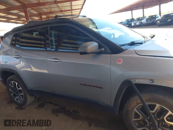 2019 Jeep Compass Trailhawk z VIN 3C4NJDDB1KT812953, wystawiony jako IAAI lot #42178451 z przebiegiem 76 269 mil mil oraz . Historia ofert i sprzedaży dostępna na DreamBid. Obrazek 13.