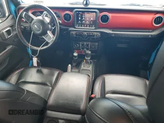 2021 Jeep Wrangler Unlimited Rubicon with VIN 1C4JJXFM4MW617635, listed as a Copart auction lot 58956205 with 52,995 mi miles and Salvage title. Bid and sale history available at DreamBid. Image 8.