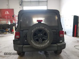 2017 Jeep Wrangler Unlimited Sport with VIN 1C4BJWDG3HL503676, listed as a IAAI auction lot 41953232 with 94,819 mi miles. Bid and sale history available at carsss.com. Image 17.