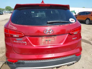 2014 Hyundai Santa Fe with VIN 5XYZT3LB1EG134837, listed as a IAAI auction lot 42454126 with 118,225 mi miles and . Bid and sale history available at DreamBid. Image 17.