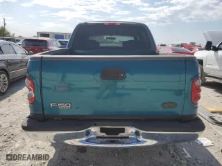 2001 Ford F-150 SuperCrew XLT with VIN 1FTRW07W61KF51152, listed as a Copart auction lot 76799164 with 154,718 mi miles and Salvage Title. Bid and sale history available at carsss.com. Image 6.