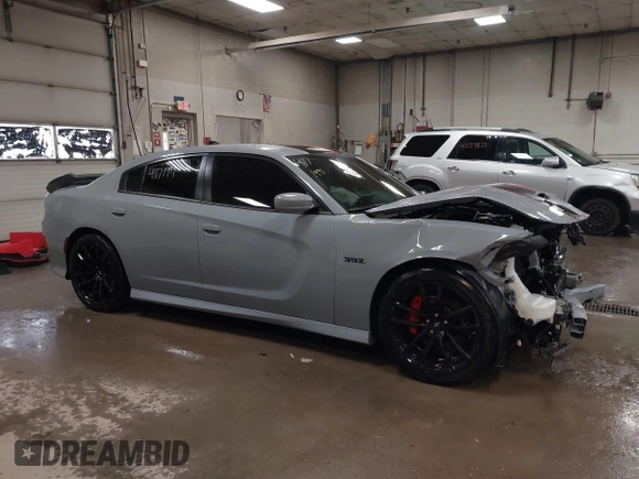 2021 Dodge Charger Scat Pack Widebody with VIN 2C3CDXGJ4MH540627, listed as a IAAI auction lot 41171991 with 31,394 mi miles and . Bid and sale history available at DreamBid. Image 14.