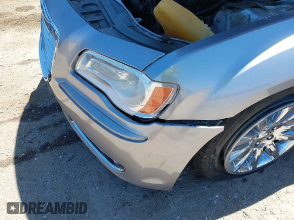 2014 Chrysler 300 with VIN 2C3CCAAG8EH264595, listed as a IAAI auction lot 42076996 with 101,659 mi miles and . Bid and sale history available at DreamBid. Image 18.