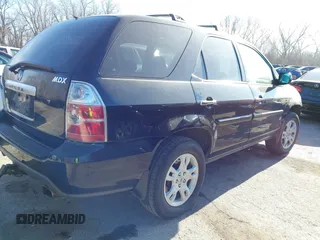 2005 Acura MDX Touring with VIN 2HNYD18985H520296, listed as a IAAI auction lot 41133862 with 173,318 mi miles. Bid and sale history available at carsss.com. Image 4.
