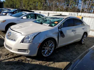 2014 Cadillac XTS Platinum z VIN 2G61T5S3XE9181530, wystawiony jako Copart lot #86481094 z przebiegiem 128 268 mil mil oraz Szkoda całkowita • Salvage title. Historia ofert i sprzedaży dostępna na DreamBid. Obrazek 1.