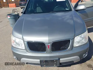 2006 Pontiac Torrent z VIN 2CKDL63F866073914, wystawiony jako IAAI lot #42014991 z przebiegiem 117 299 mil mil oraz . Historia ofert i sprzedaży dostępna na DreamBid. Obrazek 6.