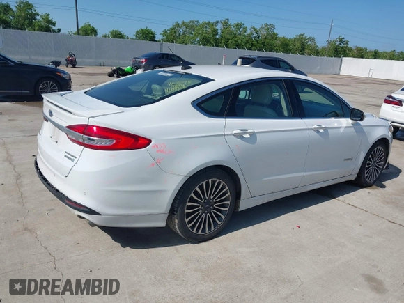 2018 Ford Fusion Titanium with VIN 3FA6P0RU3JR124007, listed as a IAAI auction lot 42207863 with 179,708 mi miles and . Bid and sale history available at DreamBid. Image 4.
