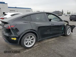 2021 Tesla Model Y Long Range with VIN 5YJYGDEEXMF294556, listed as a Copart auction lot 46668035 with 42,772 mi miles and Salvage Title. Bid and sale history available at DreamBid. Image 3.