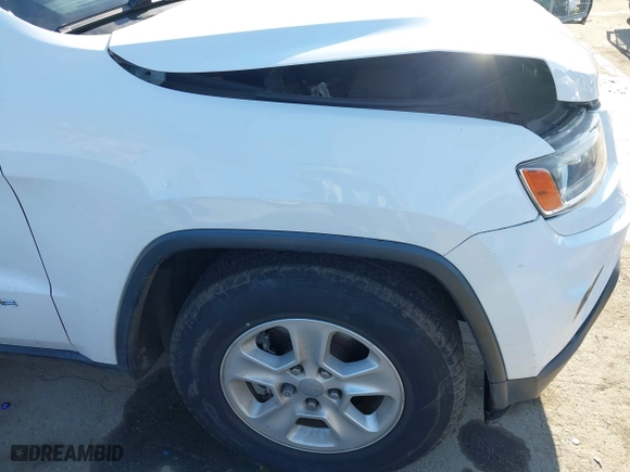 2014 Jeep Grand Cherokee Laredo with VIN 1C4RJEAGXEC130399, listed as a IAAI auction lot 41861664 with 106,925 mi miles. Bid and sale history available at carsss.com. Image 19.