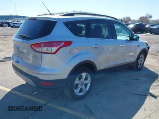 2014 Ford Escape SE with VIN 1FMCU0GX6EUE34729, listed as a IAAI auction lot 41879689 with 167,600 mi miles and . Bid and sale history available at DreamBid. Image 4.