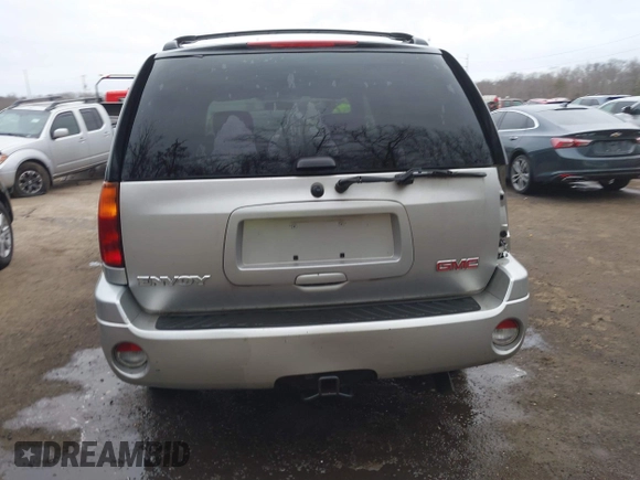 2004 GMC Envoy SLT with VIN 1GKDT13S242398113, listed as a IAAI auction lot 41722942 with 175,173 mi miles and . Bid and sale history available at DreamBid. Image 17.
