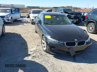 2015 BMW 3 Series 320i with VIN WBA3B1C55FK140785, listed as a IAAI auction lot 41811126 with 91,839 mi miles and . Bid and sale history available at DreamBid. Image 1.