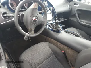 2006 Pontiac Solstice z VIN 1G2MB33B06Y101449, wystawiony jako Copart lot #74708724 z przebiegiem Nie podano mil oraz Szkoda całkowita • Salvage title. Historia ofert i sprzedaży dostępna na DreamBid. Obrazek 8.