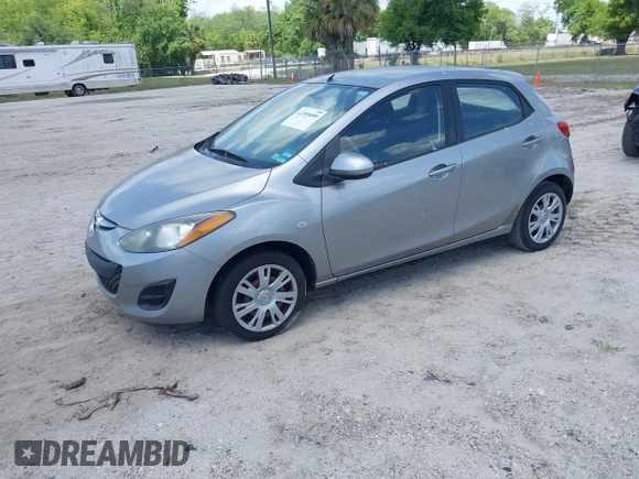 2011 Mazda 2 Sport z VIN JM1DE1HY0B0104123, wystawiony jako IAAI lot #41959099 z przebiegiem 128 918 mil mil oraz . Historia ofert i sprzedaży dostępna na DreamBid. Obrazek 2.