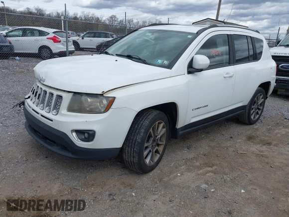 2014 Jeep Compass Limited with VIN 1C4NJDCB6ED684897, listed as a IAAI auction lot 41920568 with 175,196 mi miles. Bid and sale history available at carsss.com. Image 2.