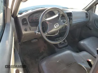 2003 Mazda B-Series 2WD Truck SX with VIN 4F4YR12D73TM20671, listed as a Copart auction lot 81981704 with 134,059 mi miles and Salvage Title. Bid and sale history available at carsss.com. Image 8.