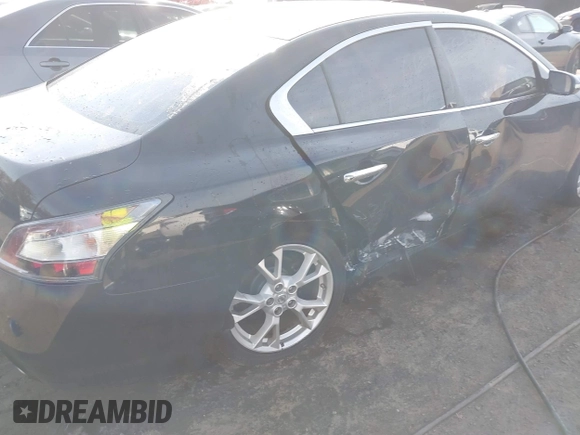 2014 Nissan Maxima S with VIN 1N4AA5APXEC487441, listed as a IAAI auction lot 40865155 with 153,495 mi miles and . Bid and sale history available at DreamBid. Image 6.