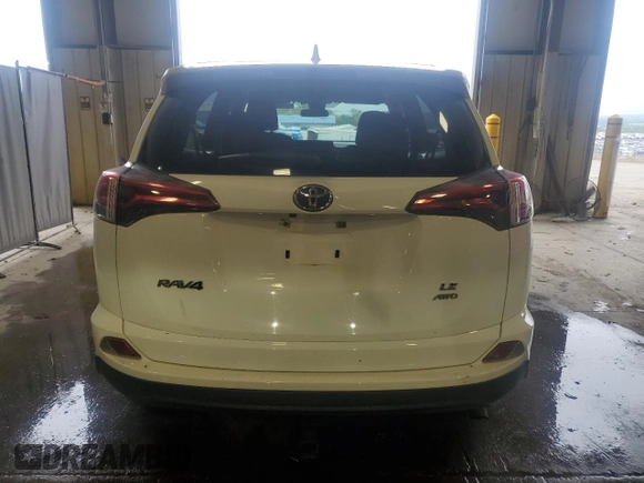 2018 Toyota RAV4 LE with VIN JTMBFREV2JJ182828, listed as a Copart auction lot 55668945 with 164,683 mi miles and Salvage Title. Bid and sale history available at DreamBid. Image 6.