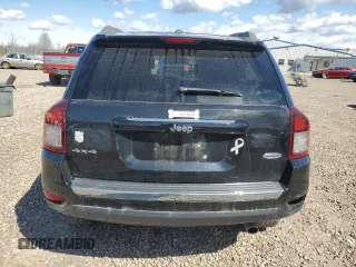 2016 Jeep Compass High Altitude Edition with VIN 1C4NJDEB0GD772702, listed as a Copart auction lot 52634105 with 74,494 mi miles and Salvage Title. Bid and sale history available at carsss.com. Image 6.