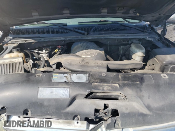 2004 Chevrolet Tahoe LT with VIN 1GNEC13ZX4J304070, listed as a Copart auction lot 59779655 with 123,241 mi miles and Salvage title. Bid and sale history available at DreamBid. Image 12.