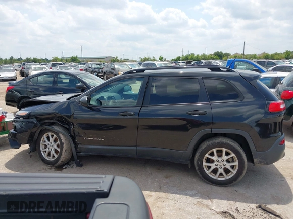2016 Jeep Cherokee Sport with VIN 1C4PJLAB5GW297349, listed as a IAAI auction lot 42367544 with 142,930 mi miles and . Bid and sale history available at DreamBid. Image 14.