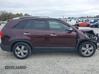 2013 Kia Sorento EX with VIN 5XYKU4A21DG312753, listed as a IAAI auction lot 41033124 with 197,459 mi miles and . Bid and sale history available at carsss.com. Image 13.