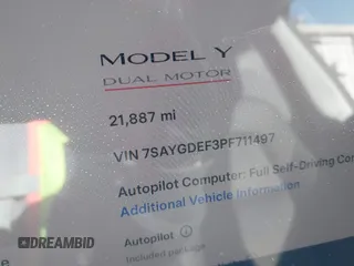 2023 Tesla Model Y Performance with VIN 7SAYGDEF3PF711497, listed as a IAAI auction lot 41877450 with 21,887 mi miles and . Bid and sale history available at DreamBid. Image 7.