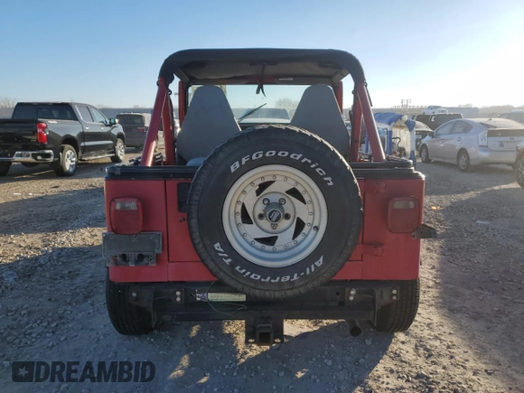 1991 Jeep Wrangler z VIN 2J4FY19P6MJ107521, wystawiony jako Copart lot #84077214 z przebiegiem 1 311 216 mil mil oraz Czysty tytuł • Clean title. Historia ofert i sprzedaży dostępna na DreamBid. Obrazek 6.