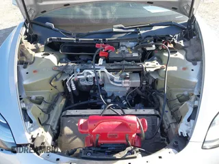2018 Tesla Model 3 Long Range Battery with VIN 5YJ3E1EB9JF065057, listed as a IAAI auction lot 41863903 with 54,584 mi miles and . Bid and sale history available at DreamBid. Image 10.