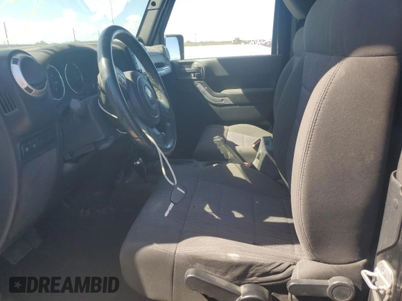 2011 Jeep Wrangler Rubicon с VIN 1J4BA6D17BL544602, выставлен на аукционе Copart как лот 76896714 с пробегом Не указан миль и На запчасти • Non repairable. История ставок и продаж доступна на DreamBid. Изображение 7.