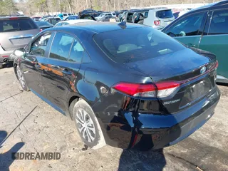 2022 Toyota Corolla Hybrid LE with VIN JTDEAMDE2NJ039206, listed as a IAAI auction lot 41592129 with 97,593 mi miles. Bid and sale history available at carsss.com. Image 3.