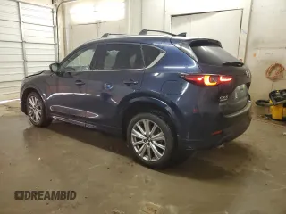 2023 Mazda CX-5 Signature with VIN JM3KFBXY9P0122887, listed as a Copart auction lot 88993465 with 12,116 mi miles and Salvage Title. Bid and sale history available at carsss.com. Image 2.