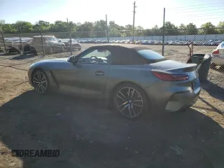 2020 BMW Z4 sDriveM40i z VIN WBAHF9C00LWW76934, wystawiony jako Copart lot #55810755 z przebiegiem 52 230 mil mil oraz Szkody całkowita. Historia ofert i sprzedaży dostępna na DreamBid. Obrazek 2.