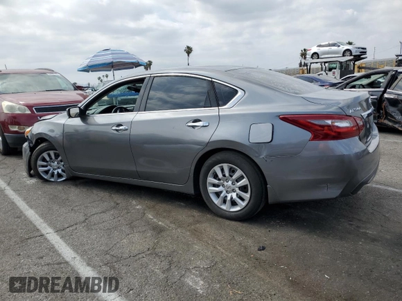 2018 Nissan Altima SV with VIN 1N4AL3AP2JC124348, listed as a Copart auction lot 54697585 with 93,964 mi miles and Salvage Title. Bid and sale history available at DreamBid. Image 2.