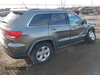 2011 Jeep Grand Cherokee 70th Anniversary with VIN 1J4RR4GT6BC715848, listed as a IAAI auction lot 41562152 with 119,910 mi miles. Bid and sale history available at carsss.com. Image 4.